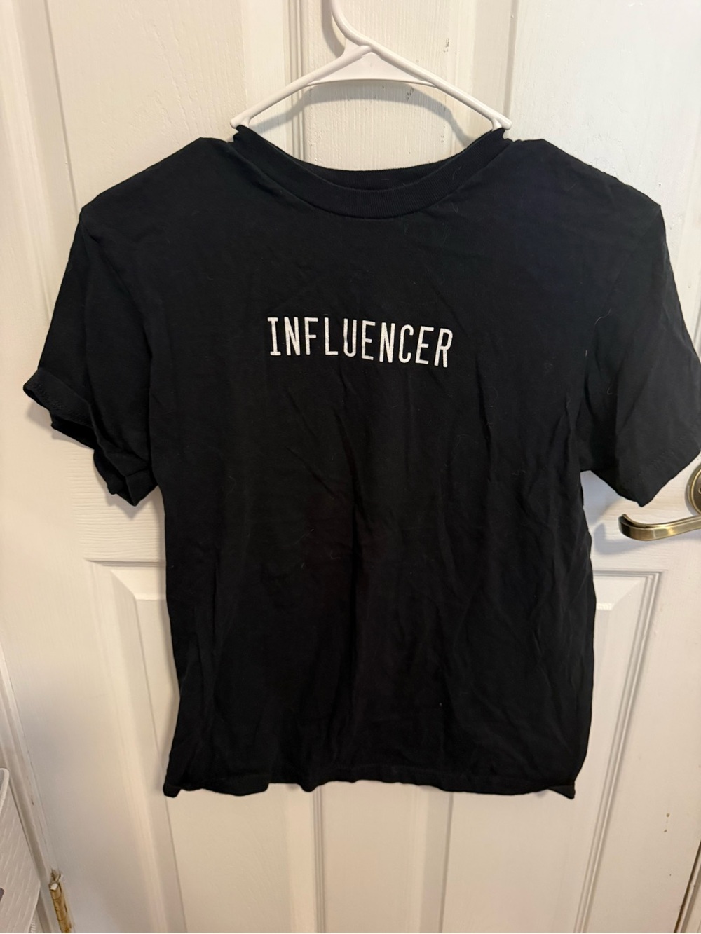 Black 'INFLUENCER' Graphic Tee by Goodie Two Sleeves